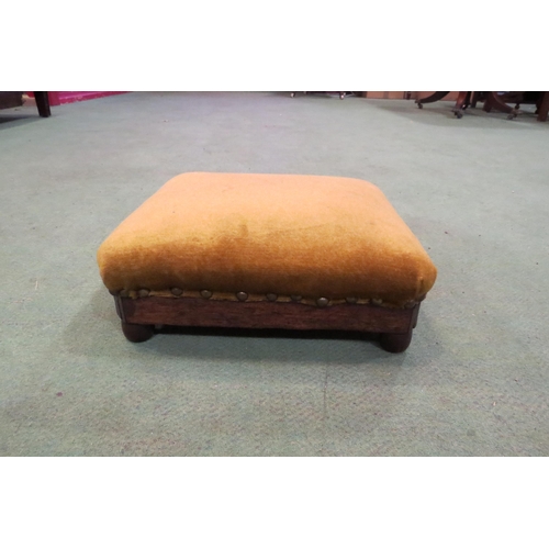 4008 - A 19th Century mahogany canted corner footstool with brass stud decoration on turned feet, 9.5cm x 2... 
