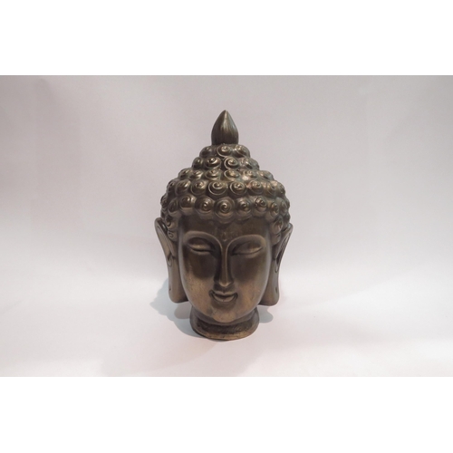 4015 - A resin bronze buddha head, 26cm tall