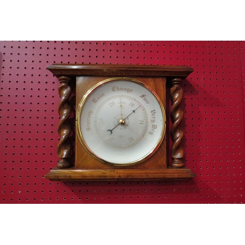 4042 - A wall barometer with barley twist supports