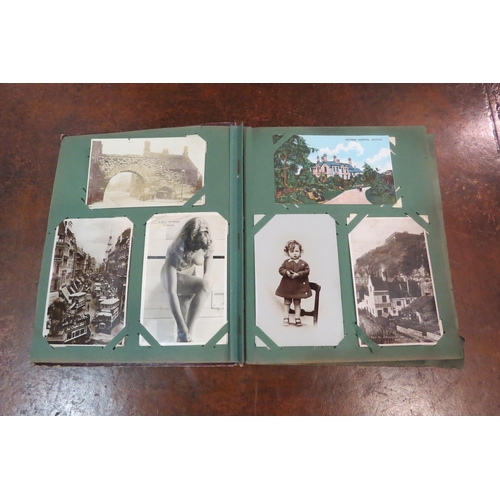 4109 - A postcard album with various contents including topographical, ships and churches