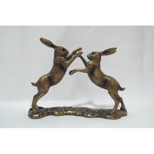 4121 - A Leonardo Collection gilt figural group of boxing Hares, 20cm tall