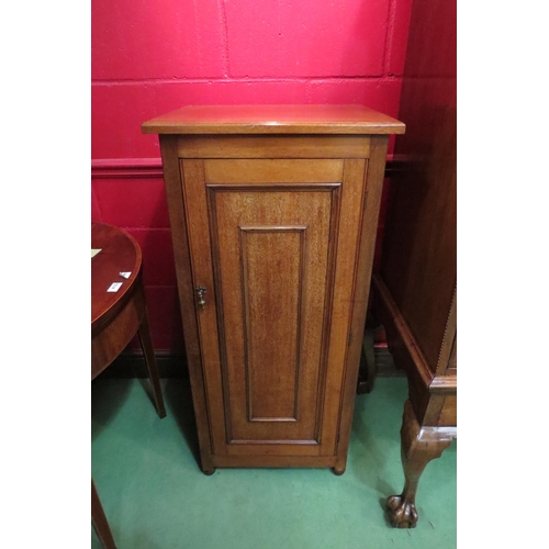 4126 - An Edwardian mahogany cabinet the single door opening to reveal four slide out shelves on bun feet, ... 