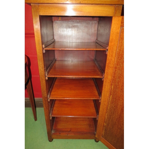 4126 - An Edwardian mahogany cabinet the single door opening to reveal four slide out shelves on bun feet, ... 