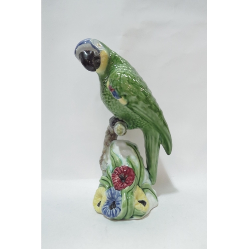 4129 - A Portuguese Bordallo Pinheiro majolica style parrot, 28cm tall