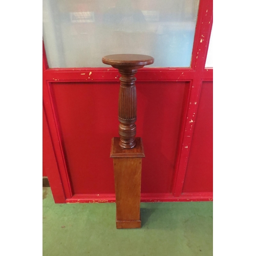 4133 - A Victorian torchiere, fluted column to square form base, 114cm tall