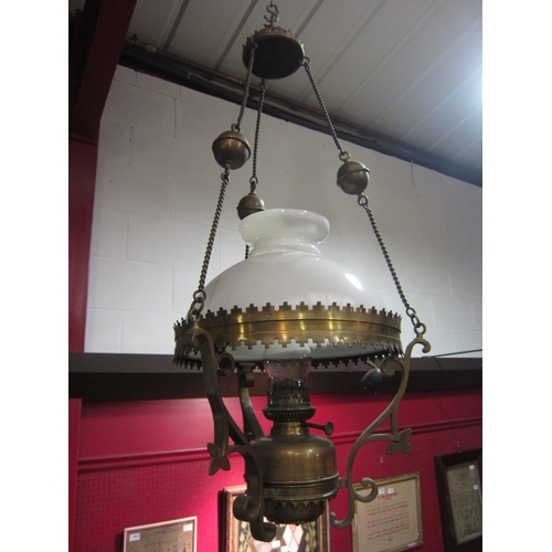 4455 - An Arts & Crafts brass ceiling light with milk glass shade