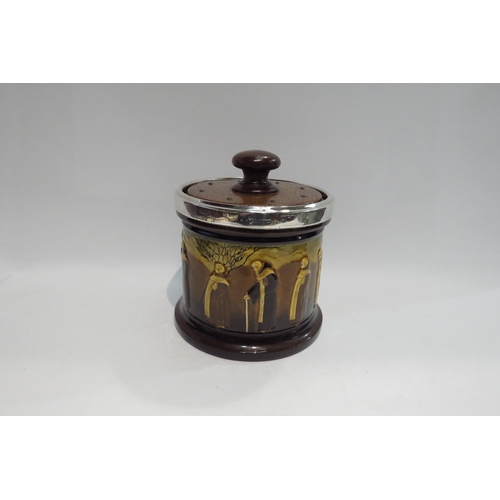 4444 - A Royal Doulton Monks design Kingsware tobacco jar, silver band, later wooden replacement lid, 15cm ... 