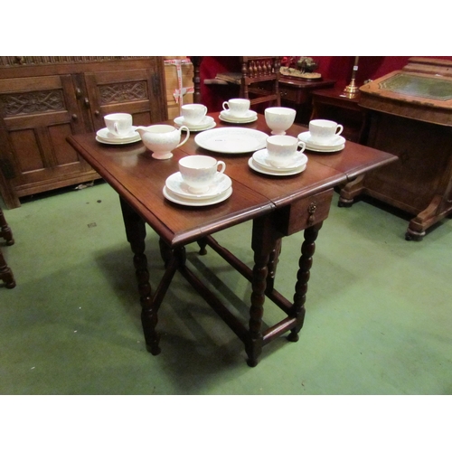 4073 - An 18th Century revival gateleg table the rising leaves over a single end drawer on bobbin turned le... 