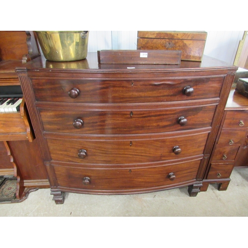 2123 - A Georgian mahogany bow front chest of four drawers