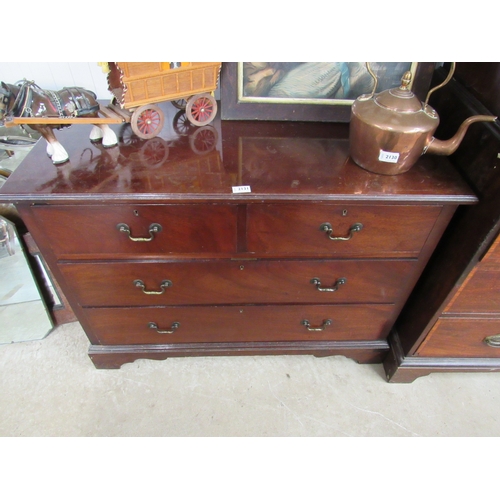 2134 - A Georgian style mahogany chest of two short over two long drawers, swan neck handles, on bracket fe... 