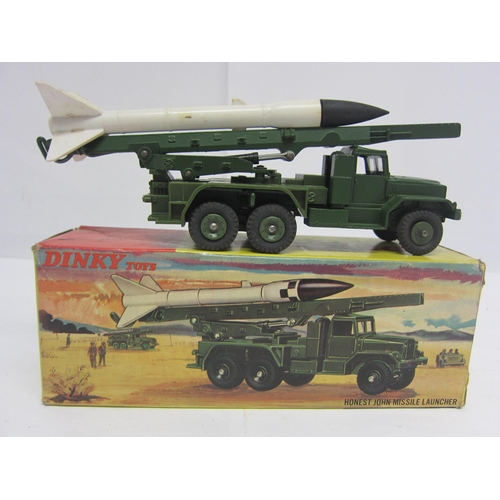 8219 - A boxed Dinky Toys diecast 665 Honest John Missile Launcher with missile