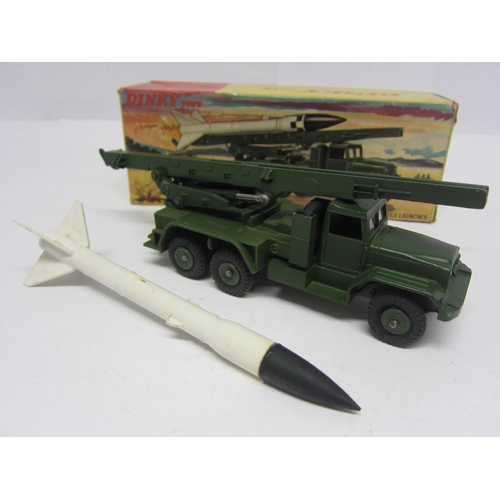 8219 - A boxed Dinky Toys diecast 665 Honest John Missile Launcher with missile