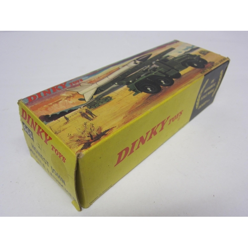 8219 - A boxed Dinky Toys diecast 665 Honest John Missile Launcher with missile