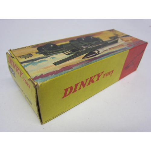 8219 - A boxed Dinky Toys diecast 665 Honest John Missile Launcher with missile