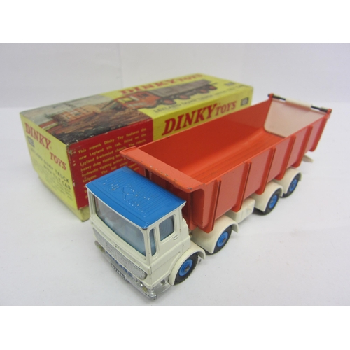 8211 - A boxed Dinky Toys diecast 925 Leyland Dump Truck with Tilt Cab, blue and white cab with pale blue i... 