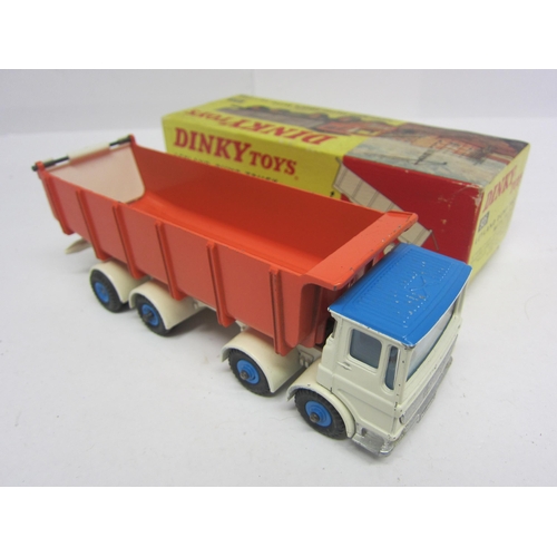 8211 - A boxed Dinky Toys diecast 925 Leyland Dump Truck with Tilt Cab, blue and white cab with pale blue i... 