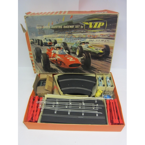 8392 - A VIP Raceways slot racing set FR1700 comprising two BRM racing cars, two hand throttles, power supp... 