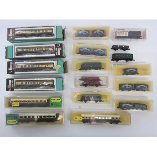 8508 - A collection of N gauge model railway rolling stock including boxed, cased and loose examples and so... 