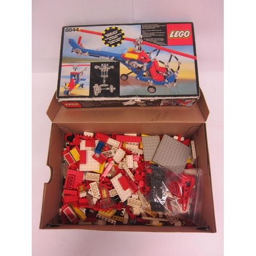 8351 - A boxed Lego set 8844 (contents unchecked) together with a collection of vintage loose Lego bricks a... 