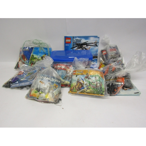 8352 - A collection of unboxed Lego sets with instructions, to include Lego City 60034 Arctic Helicrane, Le... 