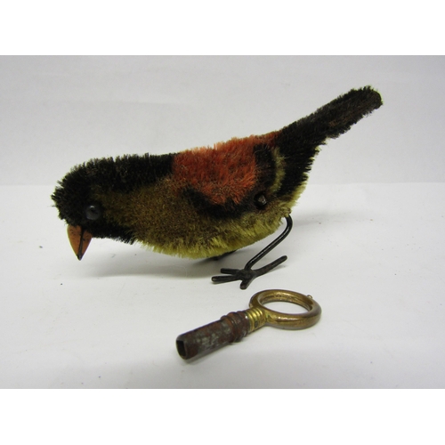 8241 - An early 20th Century Schuco mohair covered clockwork pecking bird with associated key