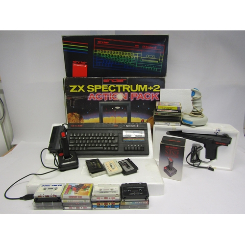 8031 - A boxed Sinclair ZX Spectrum +2 Action Pack vintage computer gaming console including light gun, joy... 