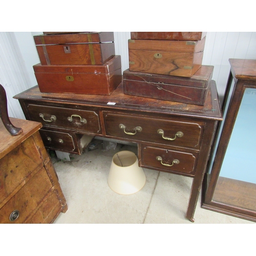 2163 - An Edwardian mahogany four drawer desk