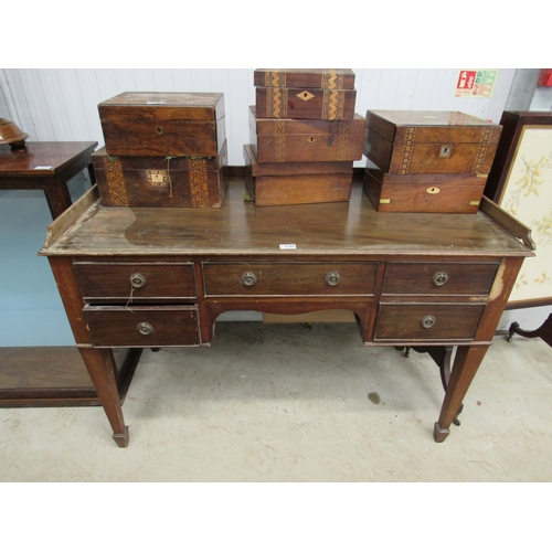 2168 - An Edwardian mahogany five drawer desk