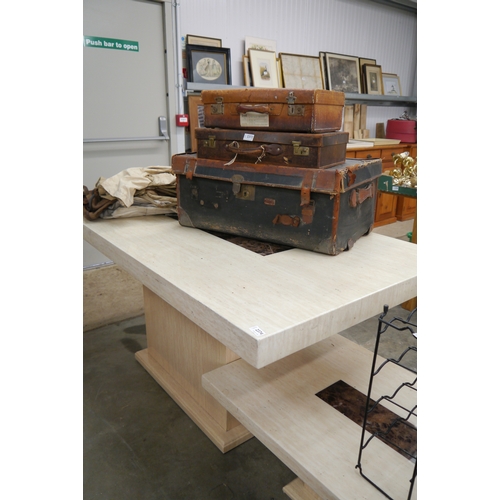 2425 - A resin marble effect dining table on pedestal base and matching coffee table