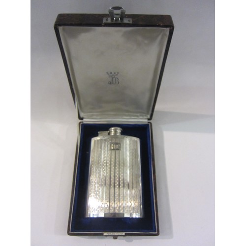 1278 - A silver hip flask of ergonomic form, engine-turned detail, 14cm long, stamped JP (JB?) silver to ba... 