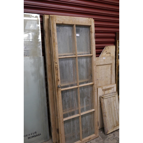 2106 - Four Georgian pine glazed cabinet doors