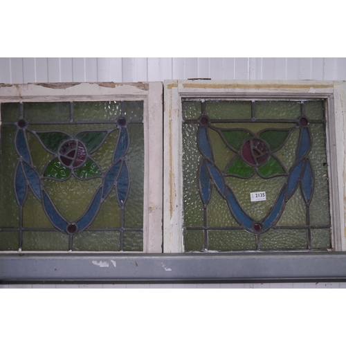 2135 - A pair of stained glass panels   (R) £20