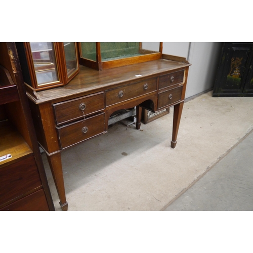 2168 - An Edwardian mahogany five drawer desk