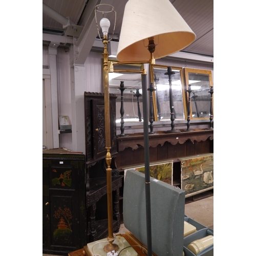 2173 - A brass and onyx standard lamp and a lounge lamp with articulating neck