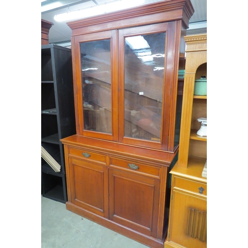 2438 - An Edwardian walnut glazed top cupbaord bookcase   (E)  £60-90