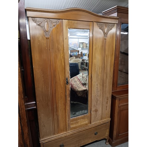 2454 - An Edwardian satinwood wardrobe with shaped cornice single drawer to base