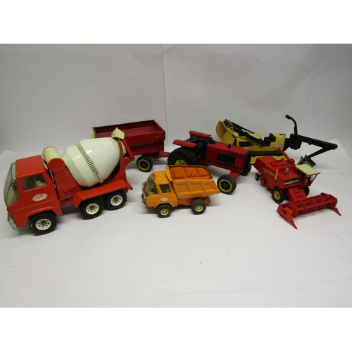 8234 - Four Tonka pressed steel vehicles to include tractor with trailer, cement mixer, tipper truck and tr... 