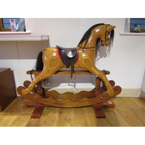 8270 - An Ian Armstrong handmade carved wooden rocking horse on trestle rocker with horsehair mane and tail... 