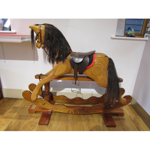 8270 - An Ian Armstrong handmade carved wooden rocking horse on trestle rocker with horsehair mane and tail... 