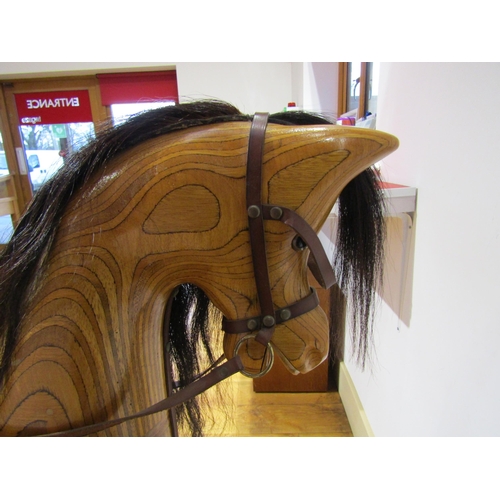 8270 - An Ian Armstrong handmade carved wooden rocking horse on trestle rocker with horsehair mane and tail... 