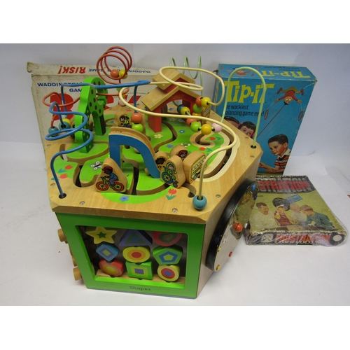 8345 - A large wooden educational playset and three vintage games to include Risk, Tip-It and Frustration (... 