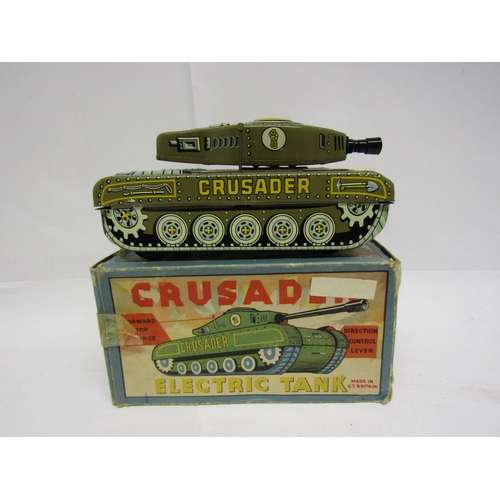 8242 - A boxed tinplate battery powered Crusader Electric Tank, made in Great Britain, model no 9/103