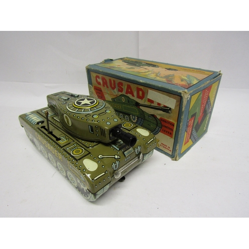 8242 - A boxed tinplate battery powered Crusader Electric Tank, made in Great Britain, model no 9/103