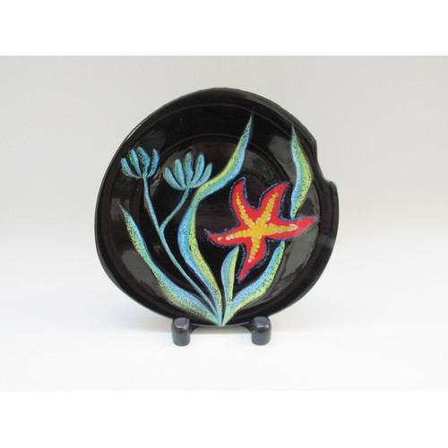 9067 - GABRIEL FAOURMAINTRAUX (1886 - 1984) 1960s asymmetrical black plate, hand painted and glazed. Seawee... 