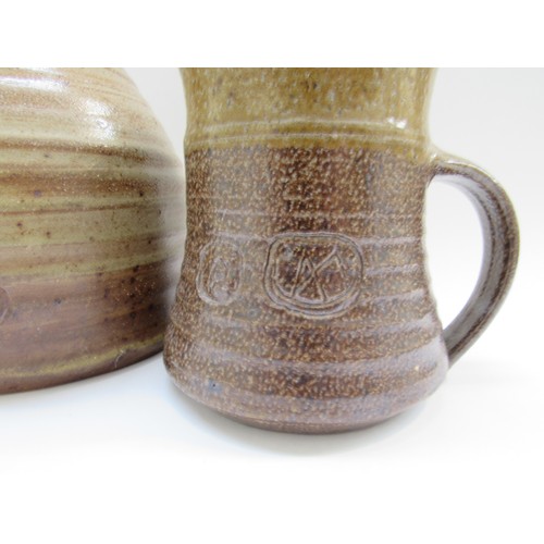 9044 - An Anthony Morris studio pottery carafe and tankard. Impressed seals. Tallest 23cm