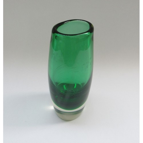 9199 - A Murano green glass vase encased in clear glass, 25cm high. Watermarked interior