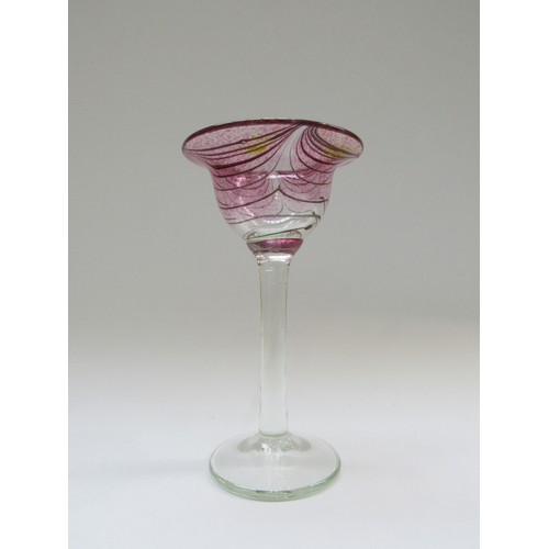 9139 - GEORGE ELLIOTT (1933 - 1998) Studio wine glass with pink combing technique pattern to bowl over a cr... 