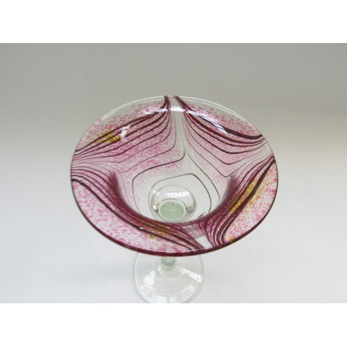 9139 - GEORGE ELLIOTT (1933 - 1998) Studio wine glass with pink combing technique pattern to bowl over a cr... 