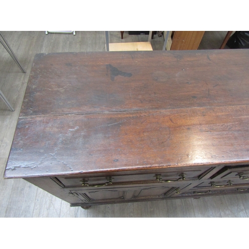 1057 - A Muirhead Moffat & Co., Glasgow, Georgian style oak sideboard with three central drawers flanked by... 