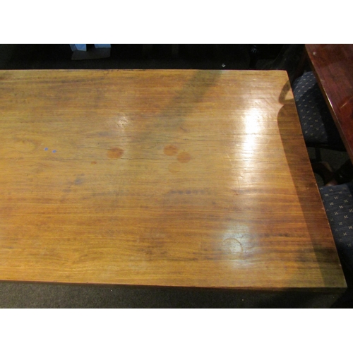 1154 - A hardwood coffee table on black painted base, 48cm tall x 214cm long x 96cm wide